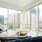 Apartment living area with ample room and natural lighting from wall-to-ceiling style windows at The Registry on the Park
