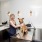 Woman washing dog in pet spa at The Registry on the Park